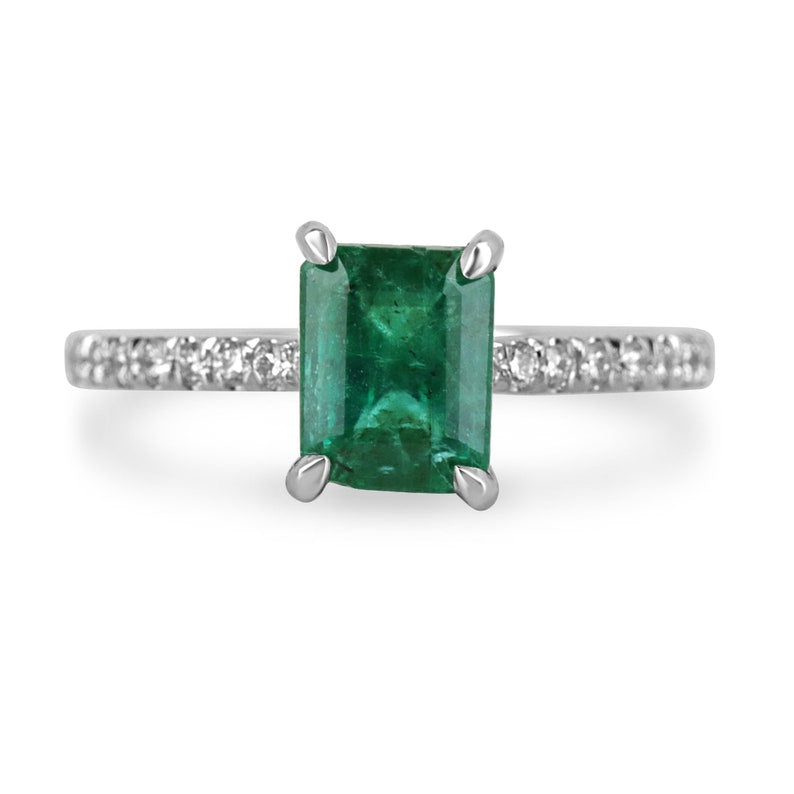 14K white gold engagement ring with a rich dark green emerald and diamond accents, designed for right hand wear.