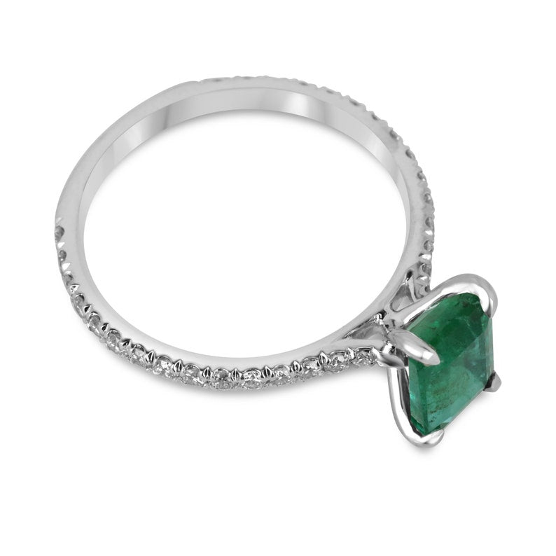 14K white gold engagement ring with a rich dark green emerald and diamond accents, featuring a right-hand ring design.