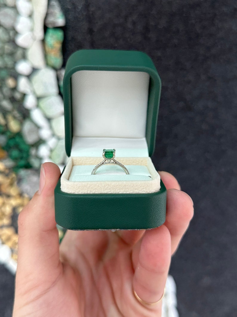 14K white gold engagement ring with a 1.95tcw dark green emerald and diamond accents from Colombian Emerald.