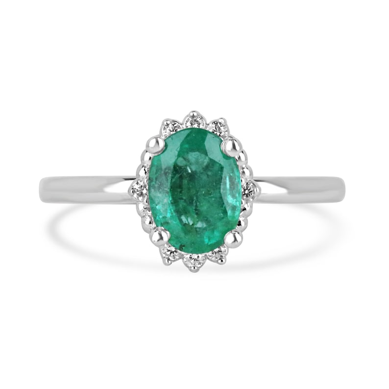 14K gold emerald ring with natural oval cut emerald and dark green diamond accents, featuring a petite medium design.