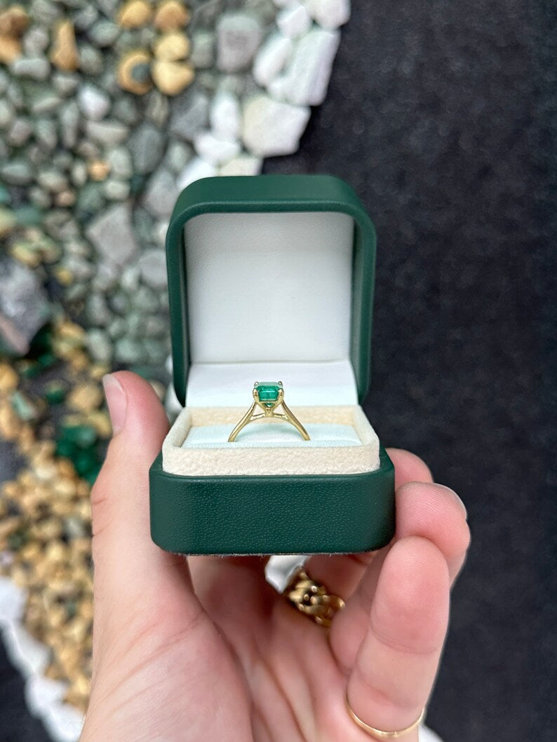 14K gold emerald cut green emerald solitaire ring with 4 prongs, right hand jewelry from Colombian Emerald brand.
