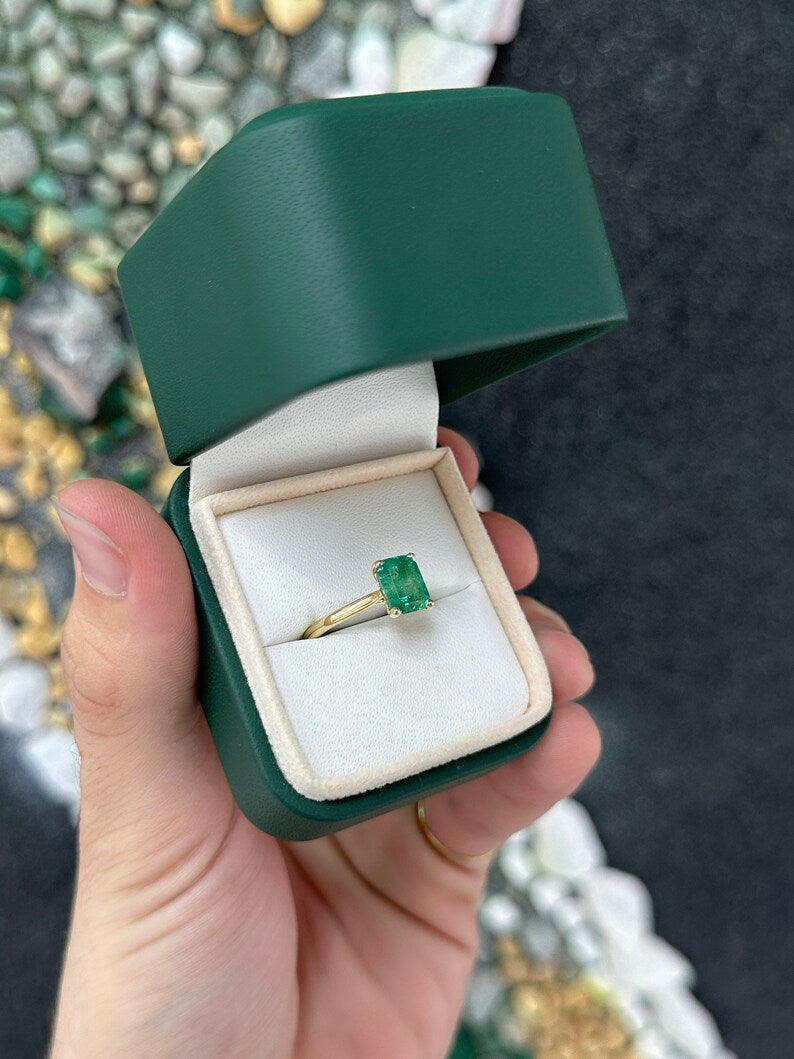 14K gold emerald cut green emerald solitaire ring with 4 prongs, designed for right hand wear, by Colombian Emerald.