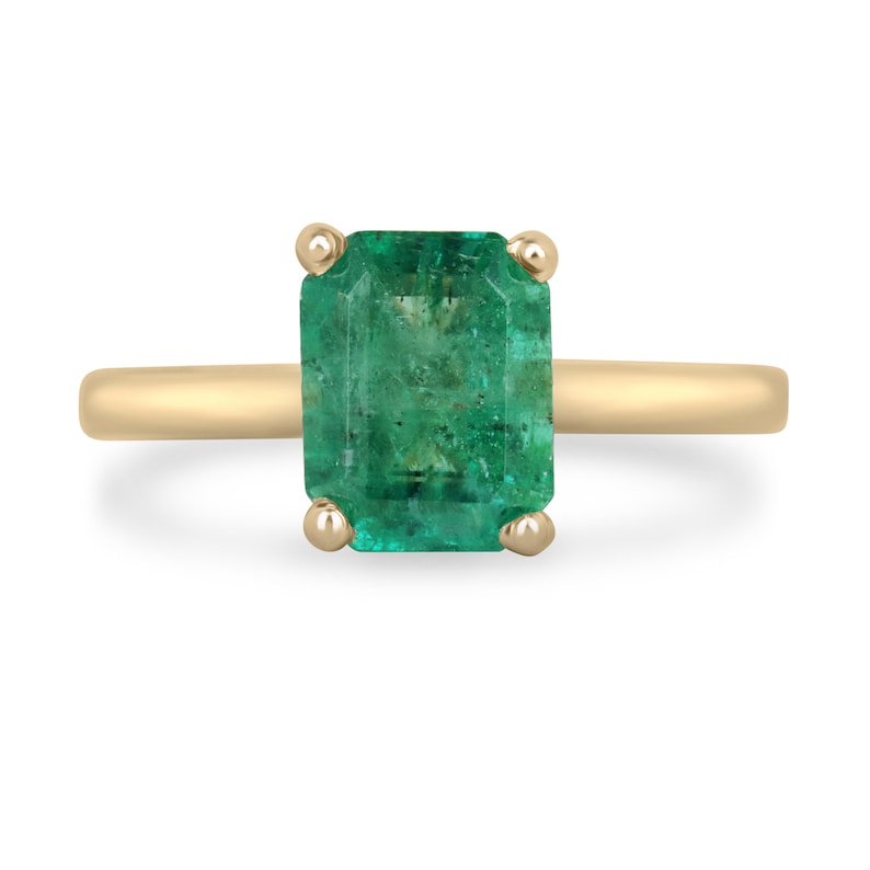 14K gold emerald cut green emerald solitaire ring with 4 prongs, perfect for right hand wear, by Colombian Emerald.