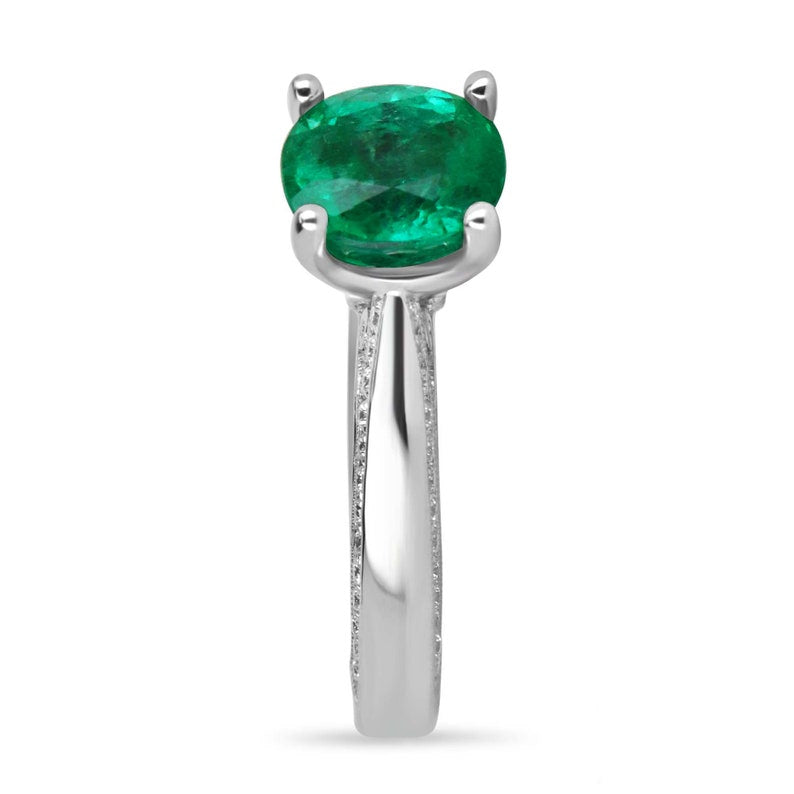Colombian Emerald engagement ring with 2.44tcw cushion-cut emerald, diamond accents, set in 18K white gold.