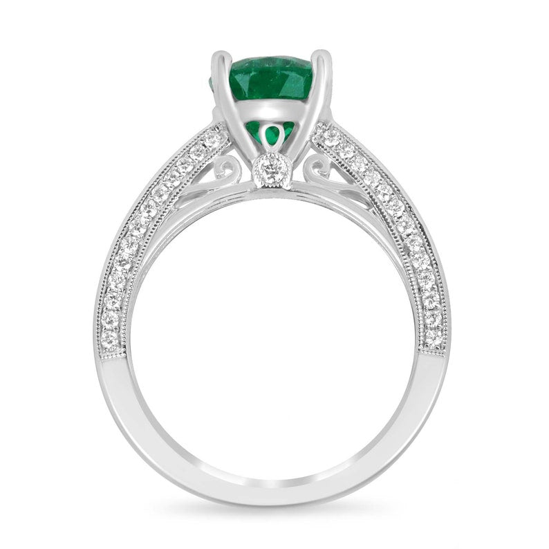 Colombian Emerald engagement ring with 2.44tcw cushion cut emerald, diamonds, 18K white gold, and AAA quality accents.