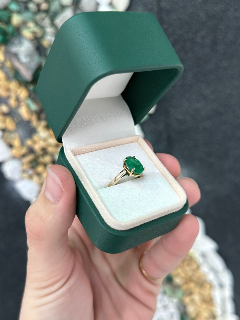 14K oval cut forest green emerald solitaire ring with 4 prongs, designed for right hand, by Colombian Emerald.