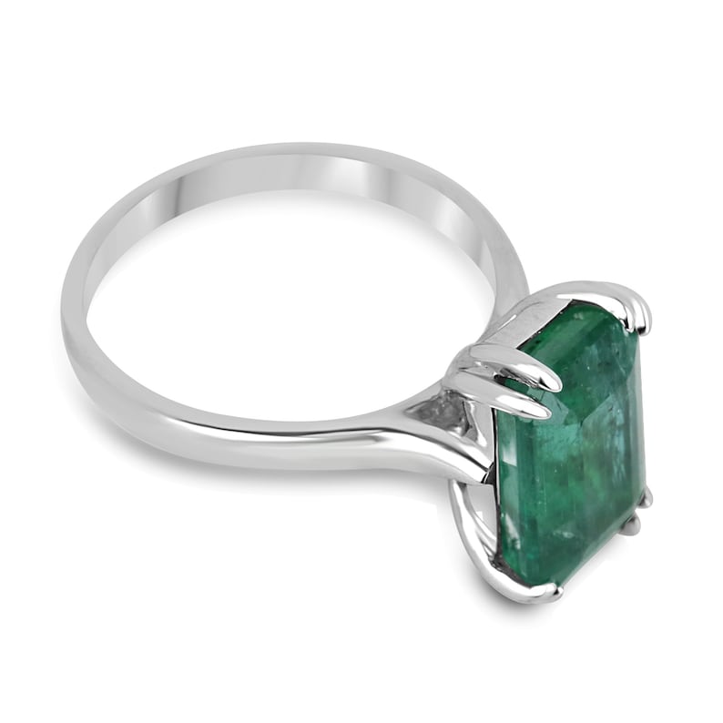 14K gold emerald cut dark green emerald solitaire ring with double claw prongs, 3.95 carats, by Colombian Emerald.