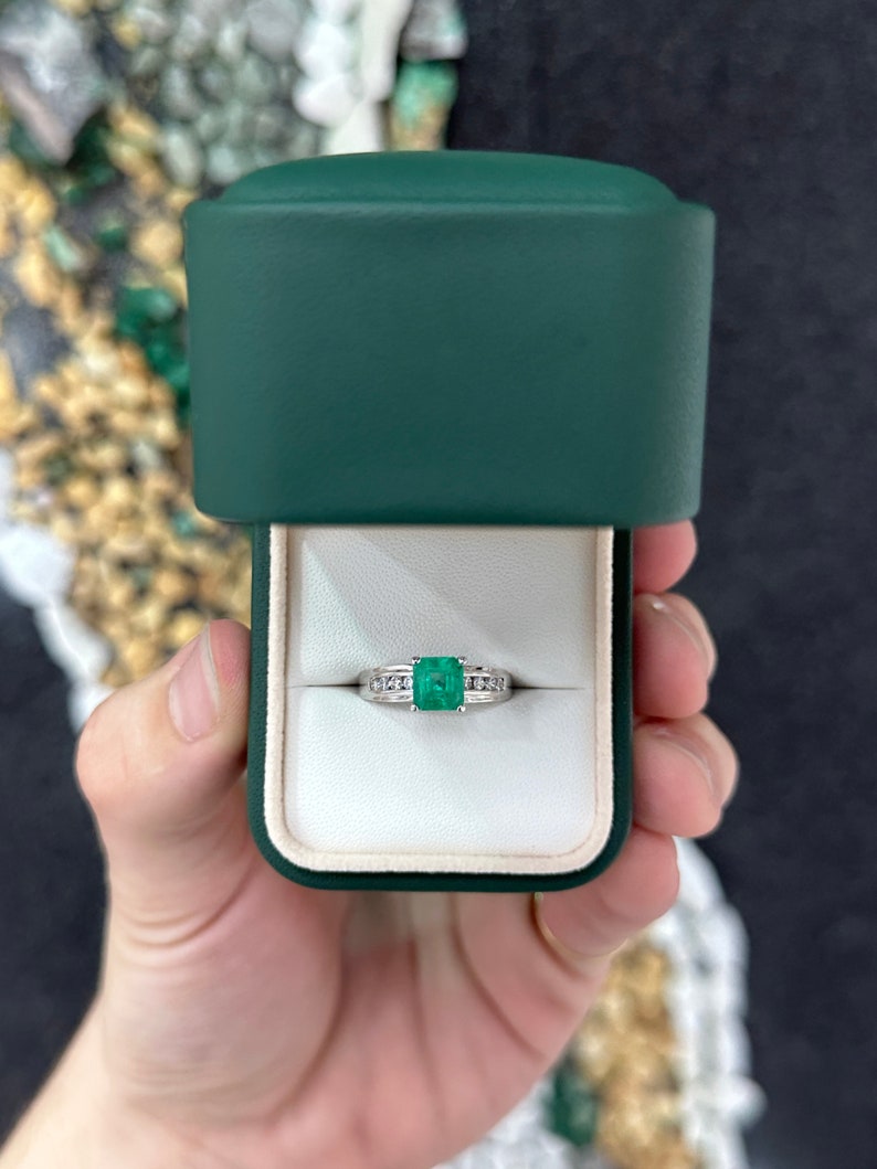 14K white gold emerald solitaire ring with diamond accents, featuring 1.74 carats total weight and Colombian emeralds.