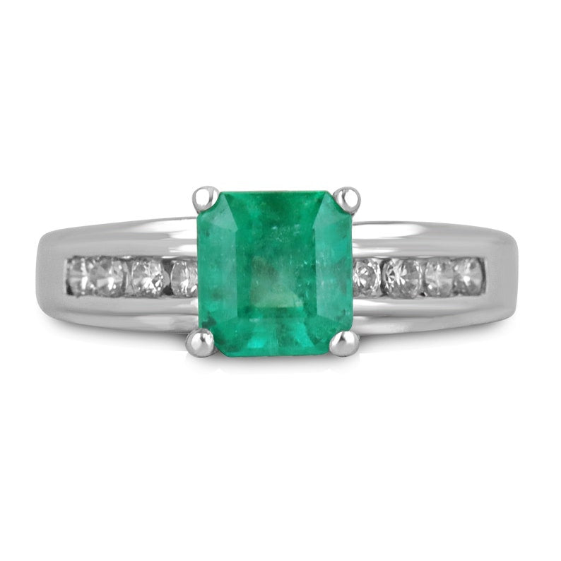 14K white gold ring with 1.74tcw earth-mined emerald and diamond accents, showcasing a stunning solitaire design.