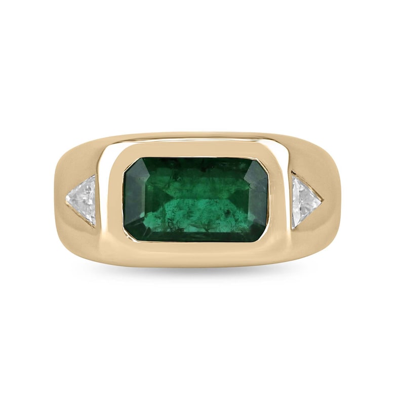 14K gold east-to-west emerald and diamond triangle ring featuring rich green emeralds and sparkling diamonds, Colombian Emerald brand.
