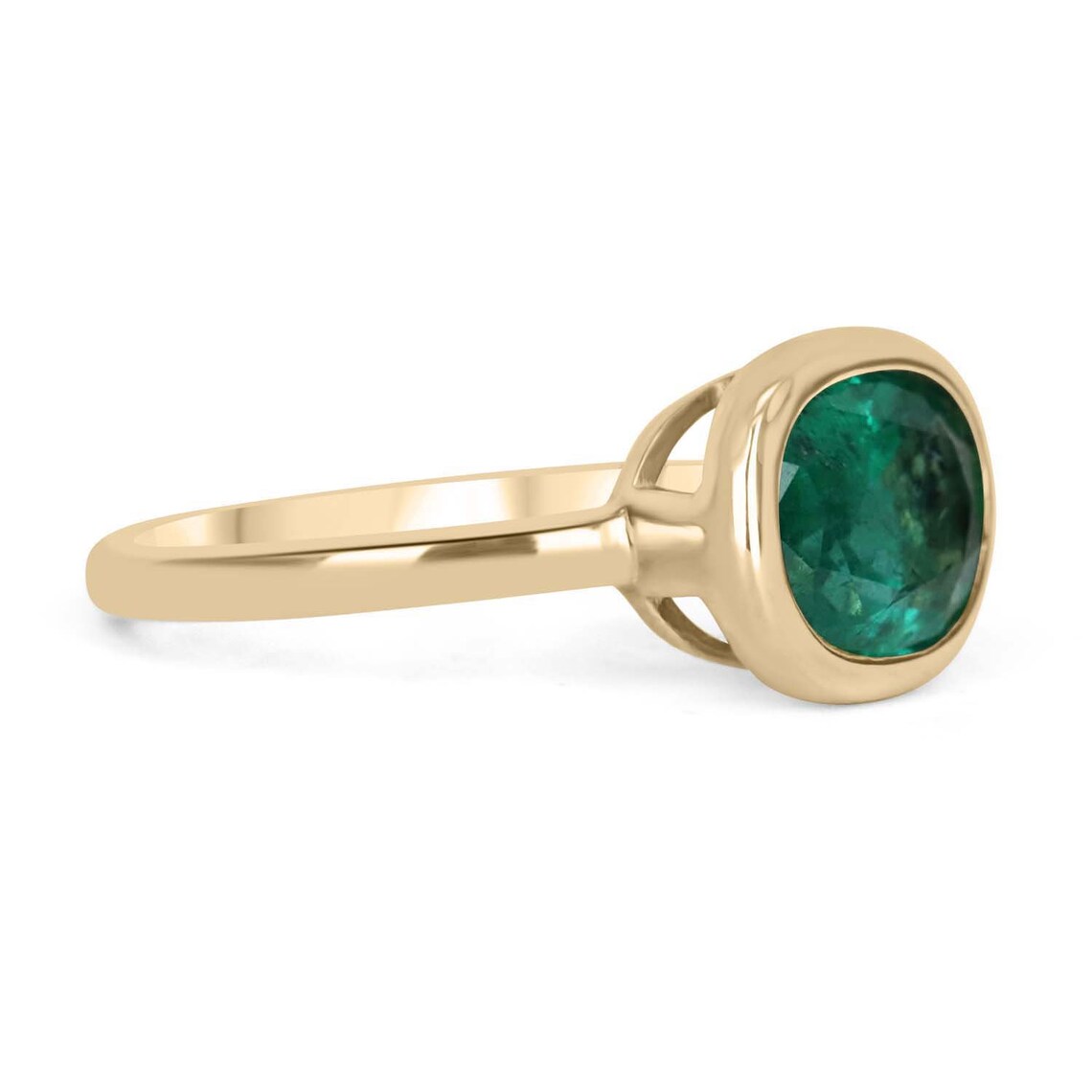 14K gold oval emerald solitaire ring with bezel setting, rich green color, east-west design by JR Colombian Emeralds.