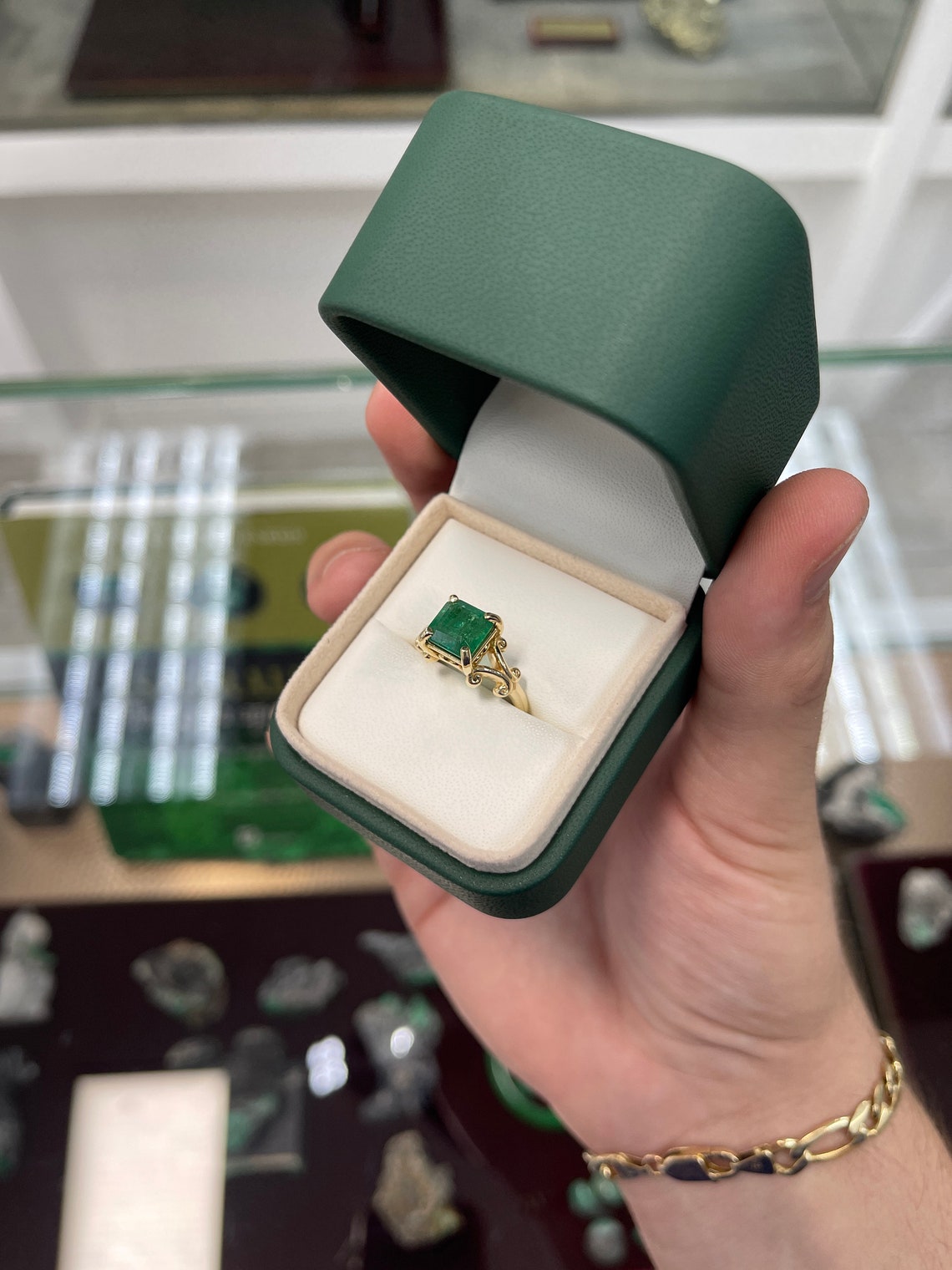Ladies emerald ring featuring a 2.63ct natural Asscher cut emerald in a 14K gold vintage four-prong setting by JR Colombian Emeralds.