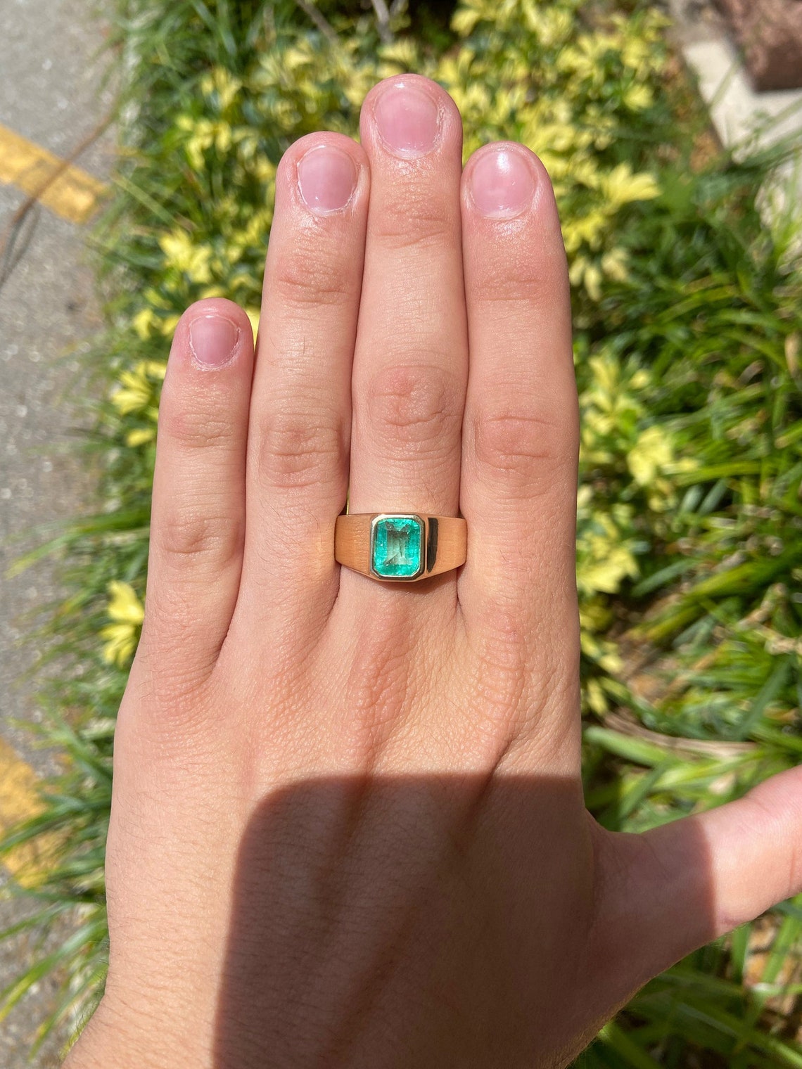 14K gold men's ring featuring a 2.80 carat Colombian emerald solitaire with bezel setting, classic and elegant jewelry piece.