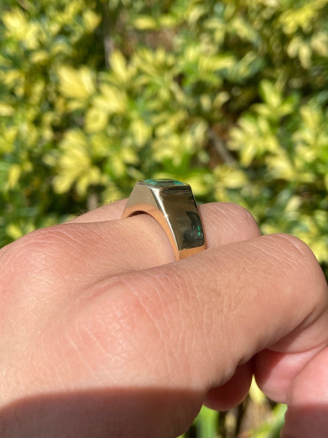 Men's 14K gold bezel ring featuring a 2.80 carat Colombian emerald solitaire by JR Colombian Emeralds.