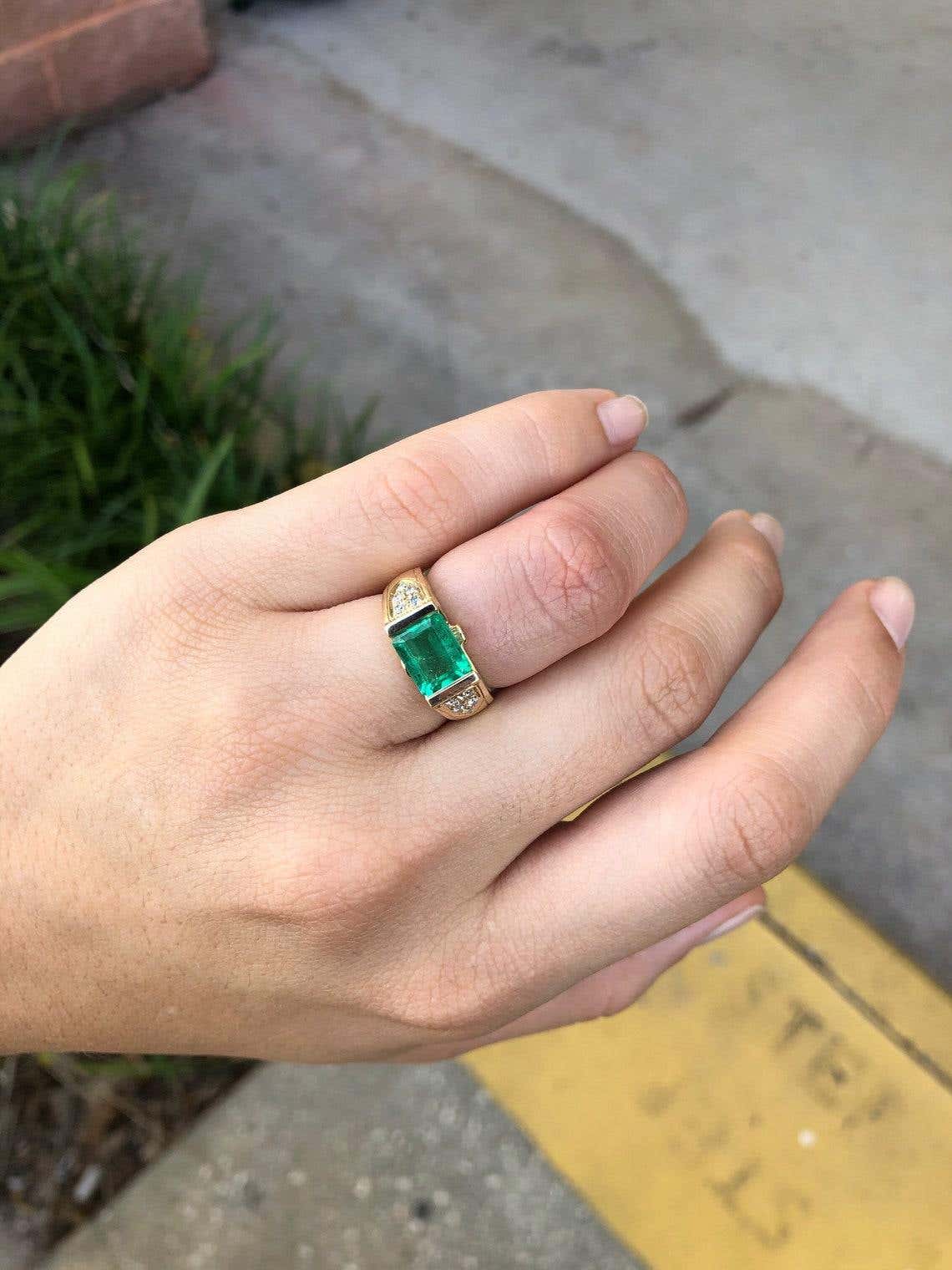 Natural 2.60ct Colombian emerald ring with east-west cut three-stone design in 14K gold by JR Colombian Emeralds.