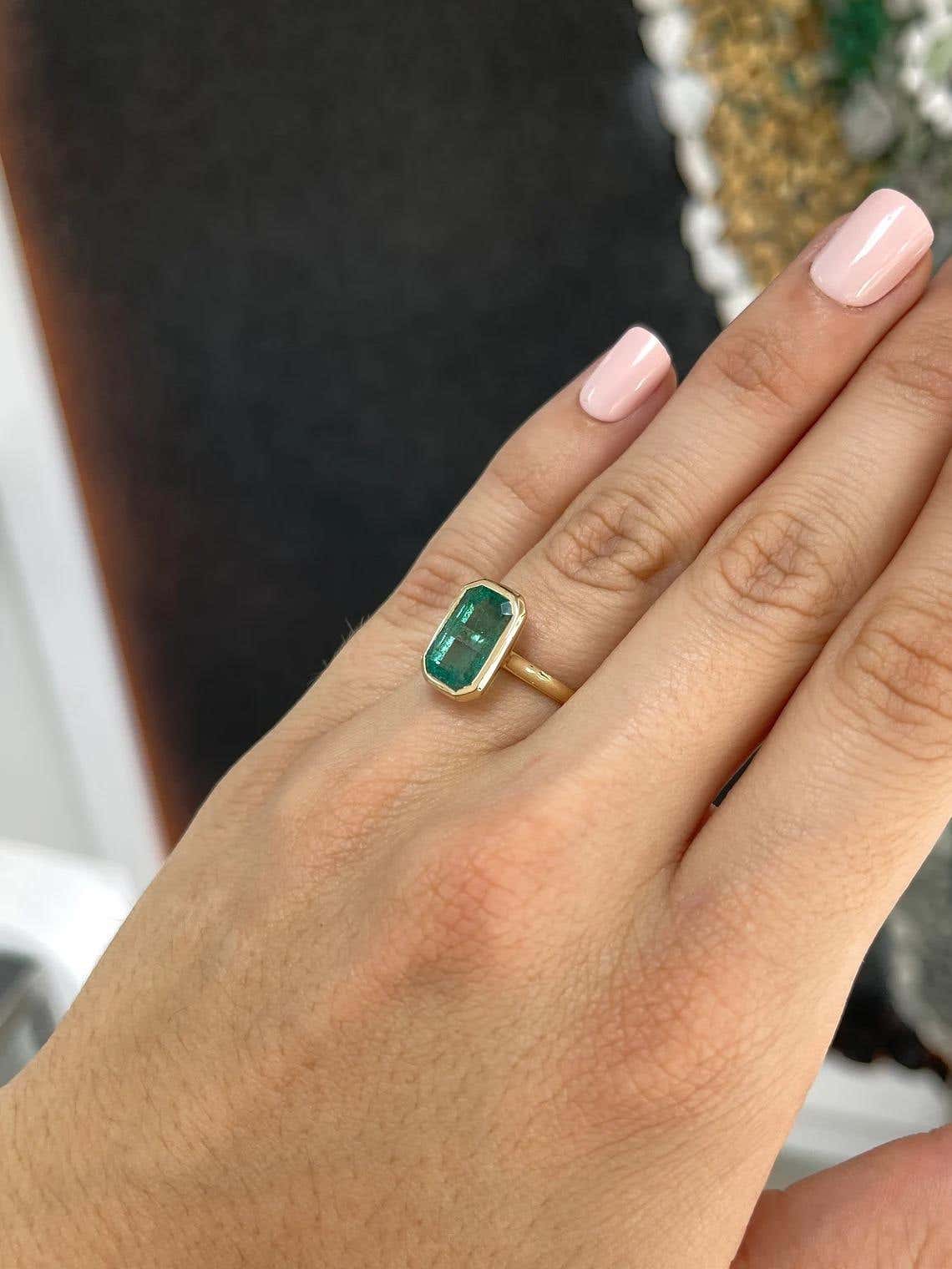 14K gold emerald cut natural emerald engagement ring with bezel setting, 4.76 carats, blue-green color, by JR Colombian Emeralds