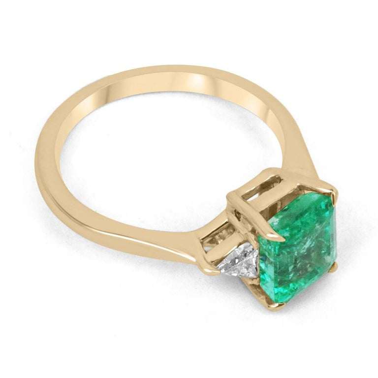 2.45tcw 18K Emerald Cut Emerald & Trillion Cut Diamond 3 Stone Prong Gold Ring