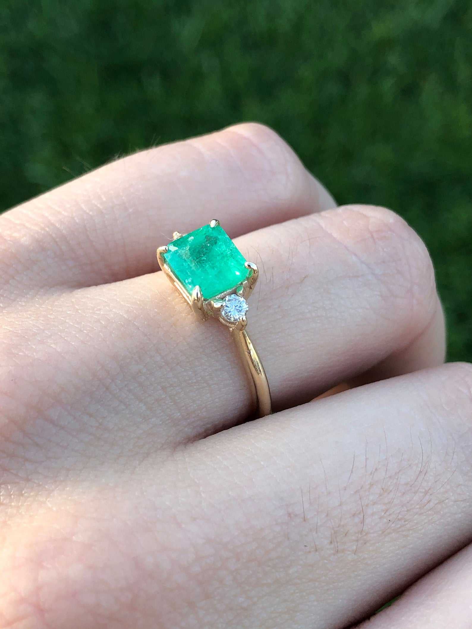 Celebrate Brilliance: 14K Gold Ring Featuring 1.96tcw Three Stone Emerald & Round Diamond Trio