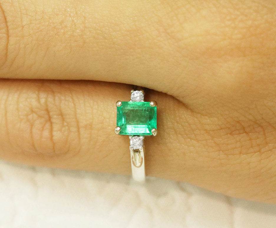 Emerald Cut 1.60tcw Emerald & Diamond Modern 3 Stone Ring 14K Gold on finger