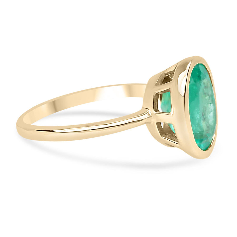 Dazzling Brilliance: 3.0 Carat Bezel Set Oval Emerald Solitaire Bezel Ring - 14K Gold Elegance