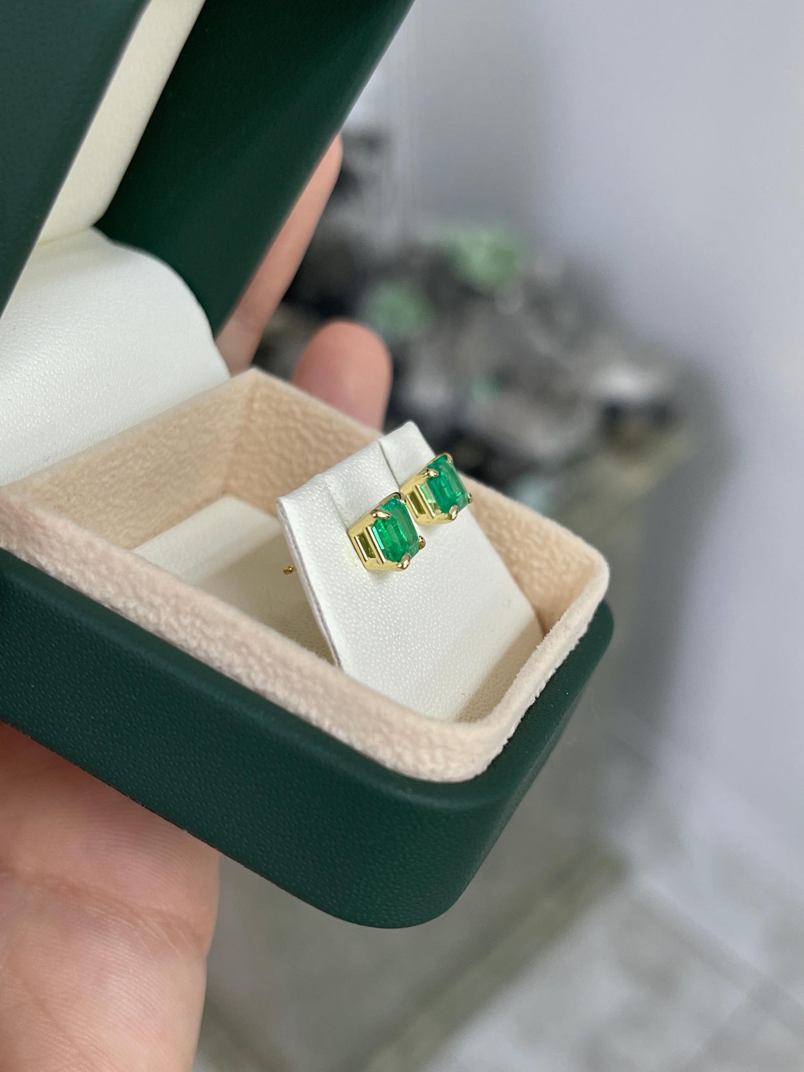 JR Colombian Emeralds 1.46tcw Muzo Green Asscher Cut Colombian Emerald stud earrings with four prongs.