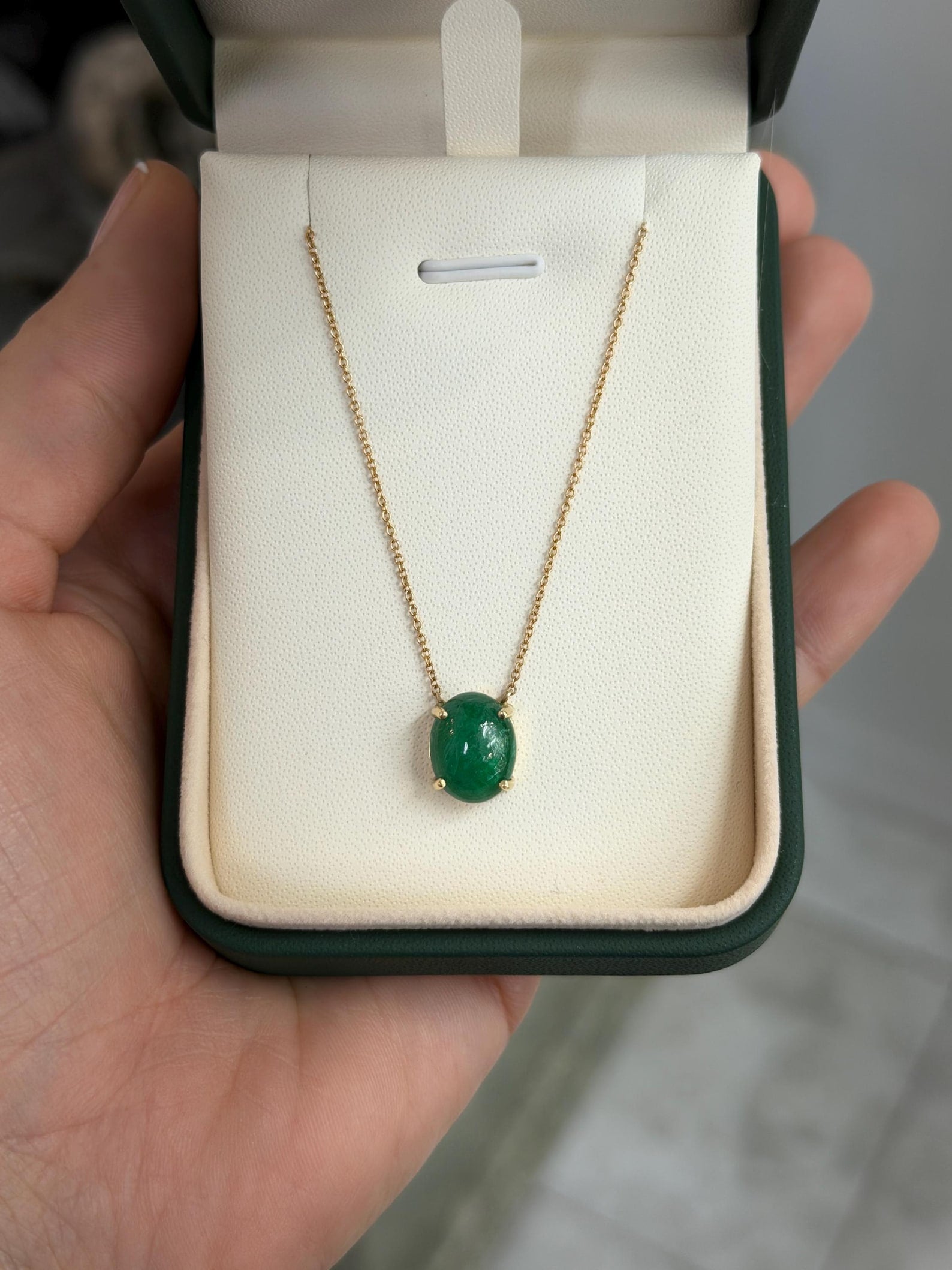 14K gold necklace with 5.50tcw Zambian emerald cabochon pendant on prong station chain, from JR Colombian Emeralds.