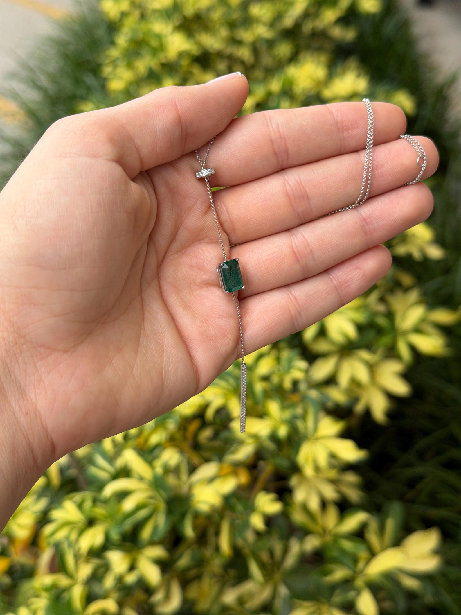 Natural emerald and diamond lariat necklace in 14K white gold with 3.25 carats total weight, from JR Colombian Emeralds.