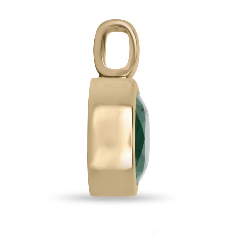 Oval Cut Emerald Bezel Set in 14K Gold