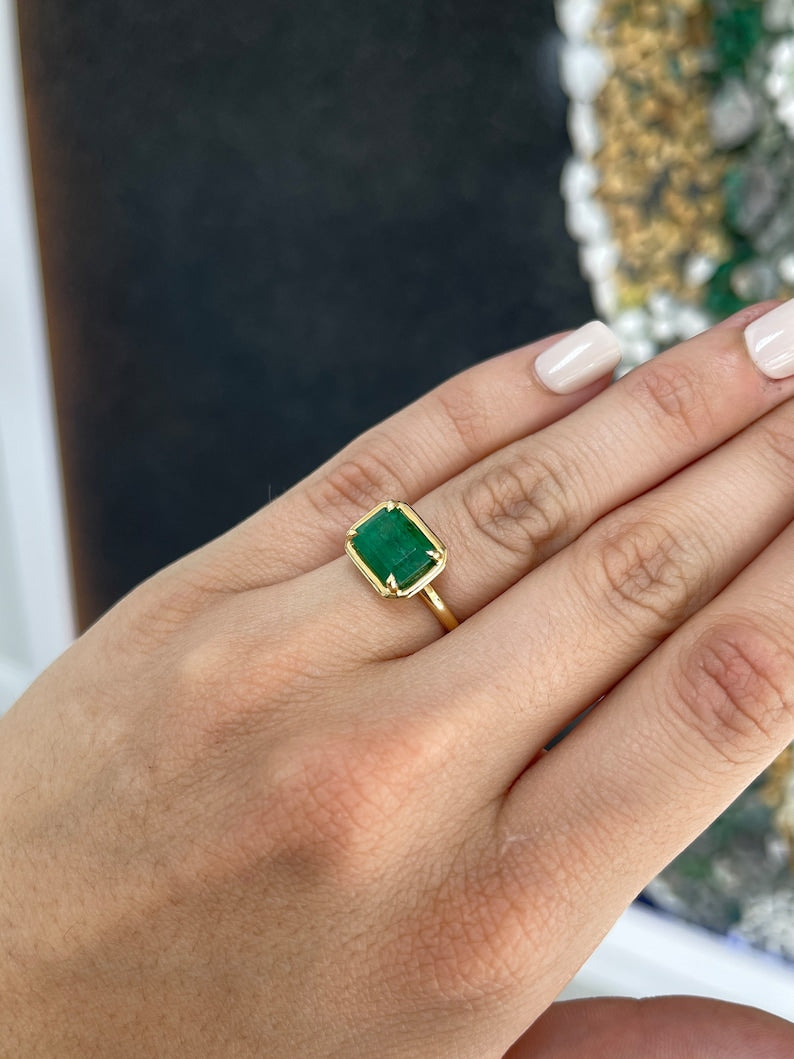 3.92ct 18K Gold Forest Green East to West Four Prong Emerald Solitaire Ring