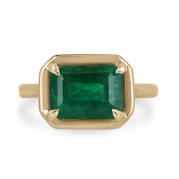Four Prong Emerald Solitaire Ring