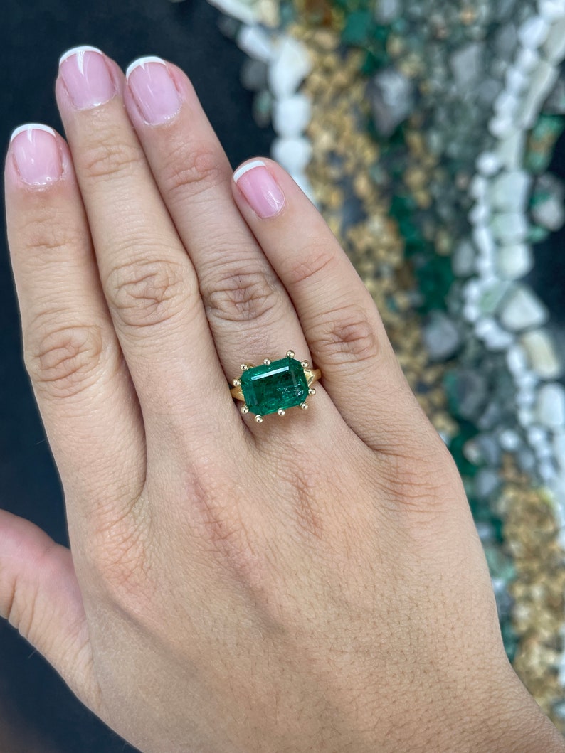 Offset Prong Emerald Ring