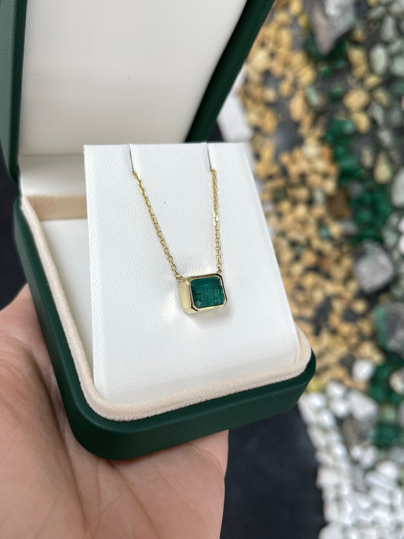 Stationary E-W Emerald Necklace