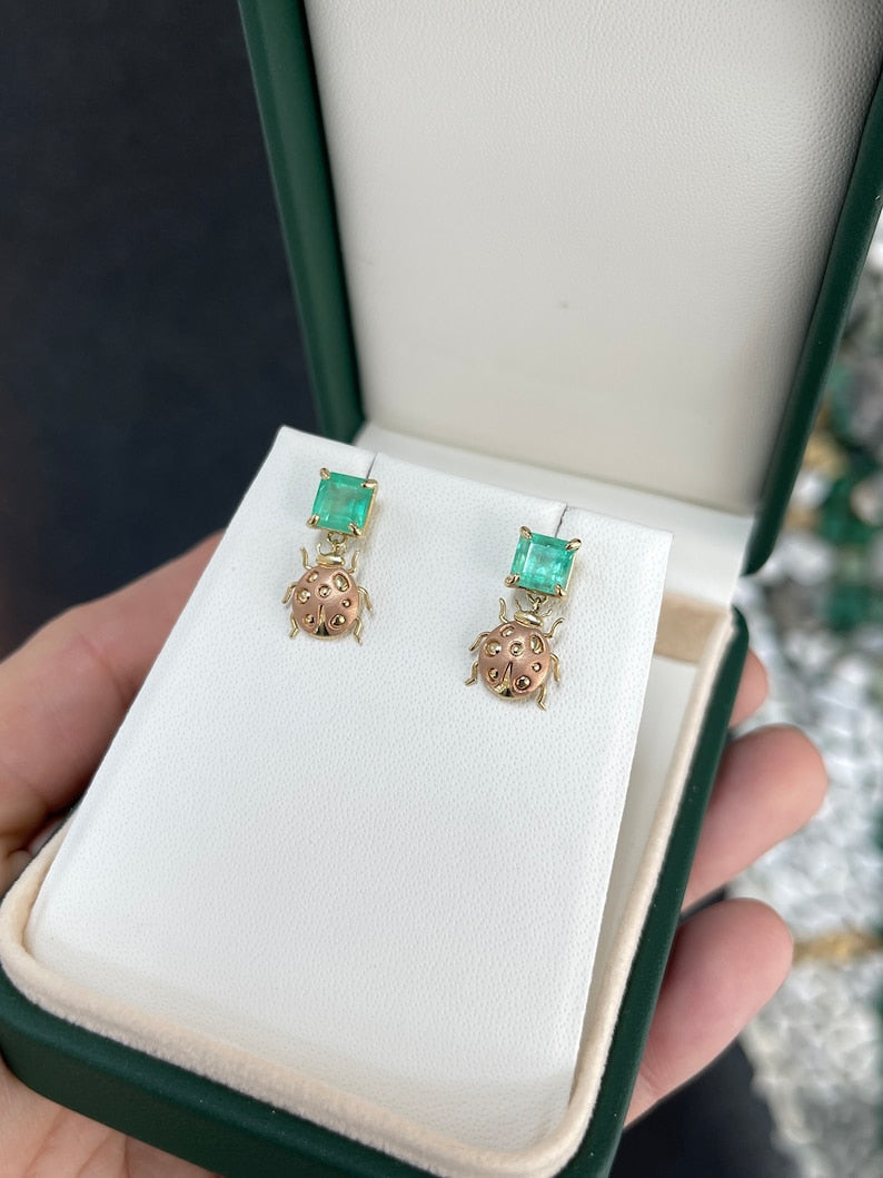 Elegant Rose Gold Earrings with Medium Green Emeralds and Lady Bug Charm