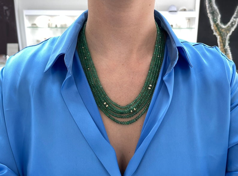 Exquisite Five-Strand Bead Necklace Featuring a 294+ Carat Medium Green Round Emerald Rondelle in 14K Gold