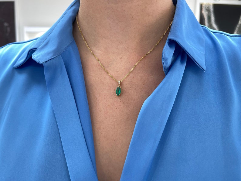 1.04tcw 18K Gold Marquise Solitaire Cut Emerald & Diamond Accent Necklace