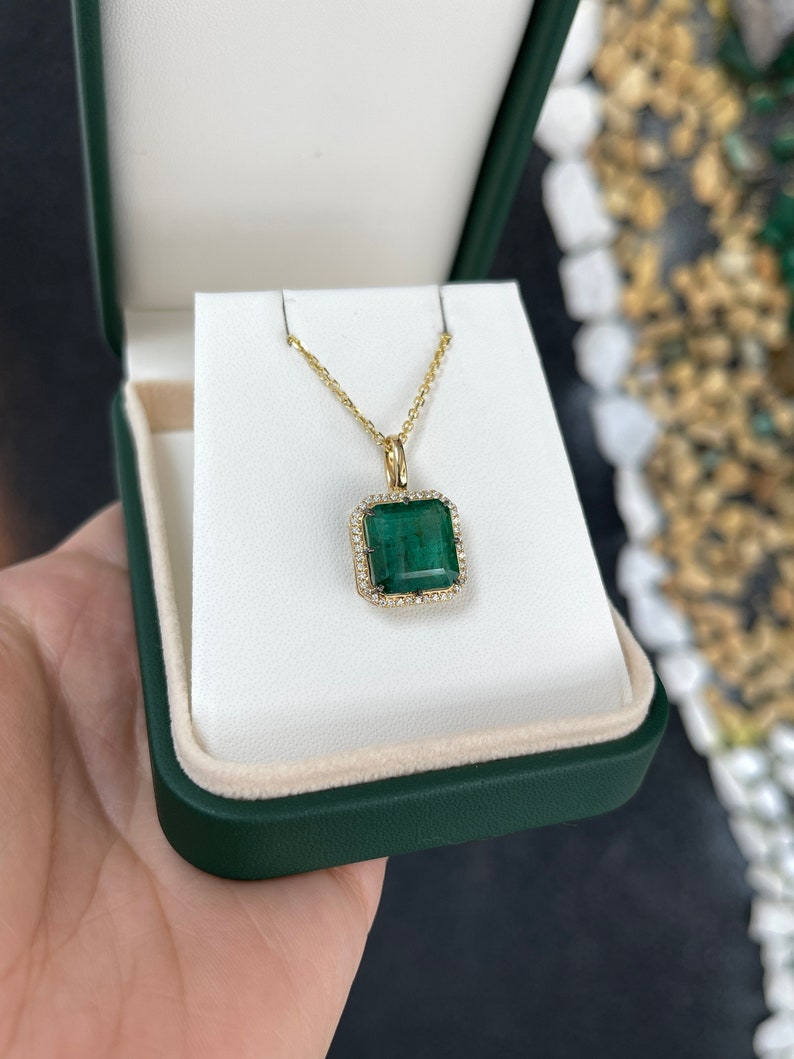 Elegant 6.97tcw Emerald and Diamond Jewelry Piece