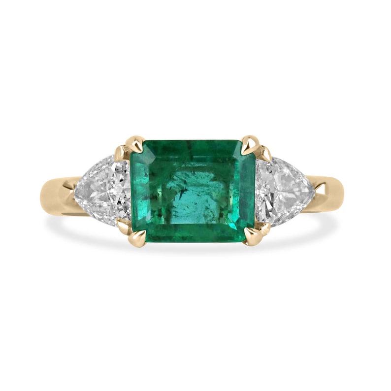 Emerald Cut Four Prong Solitaire Ring