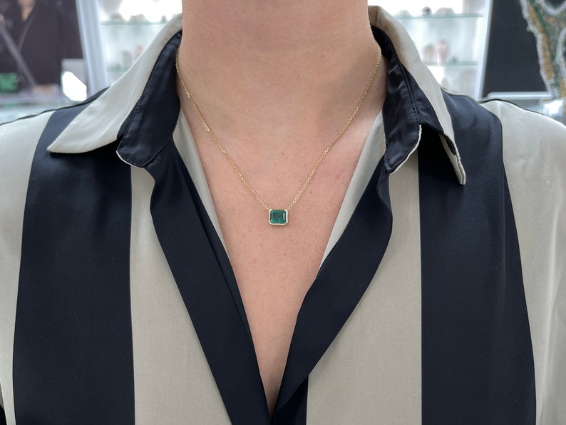 4.20 Carat East to West Deep Bluish Green Emerald Cut Bezel Set Necklace 14K