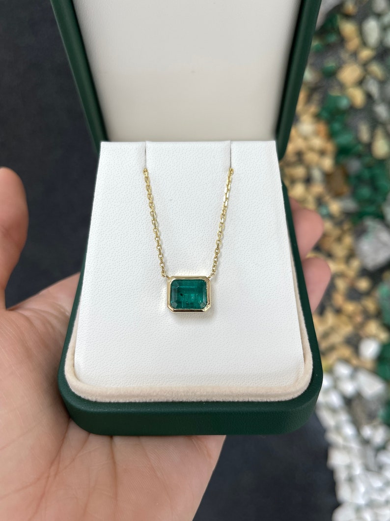 4.20ct 14K East to West Deep Bluish Green Bezel Set