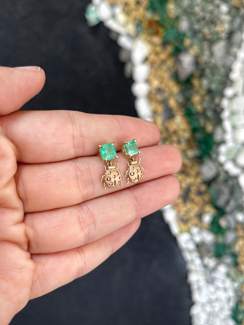 2.0tcw 14K Medium Green Emerald Asscher Cut & Rose Gold Lady Bug Dangle Earrings - JR Colombian Emeralds