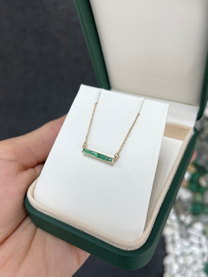 Baguette Cut Emerald Set East to West