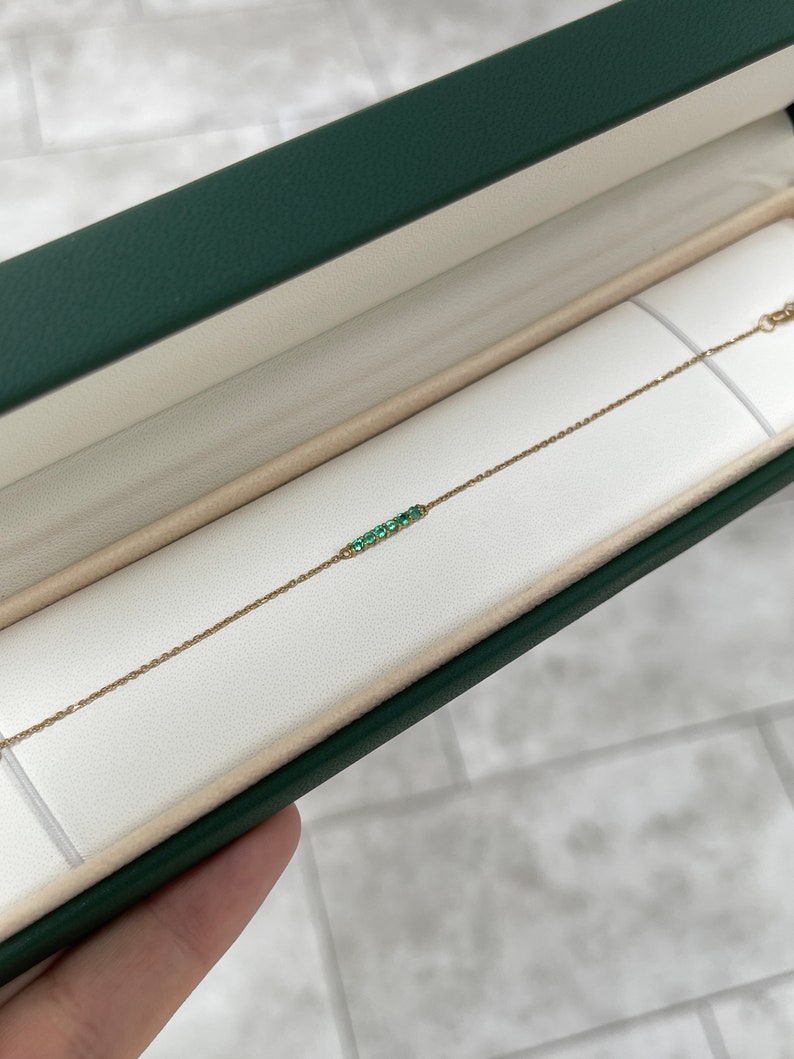0.25tcw 14K Natural Vivid Medium Green Round Emerald Bar Prong Set Gold Bracelet