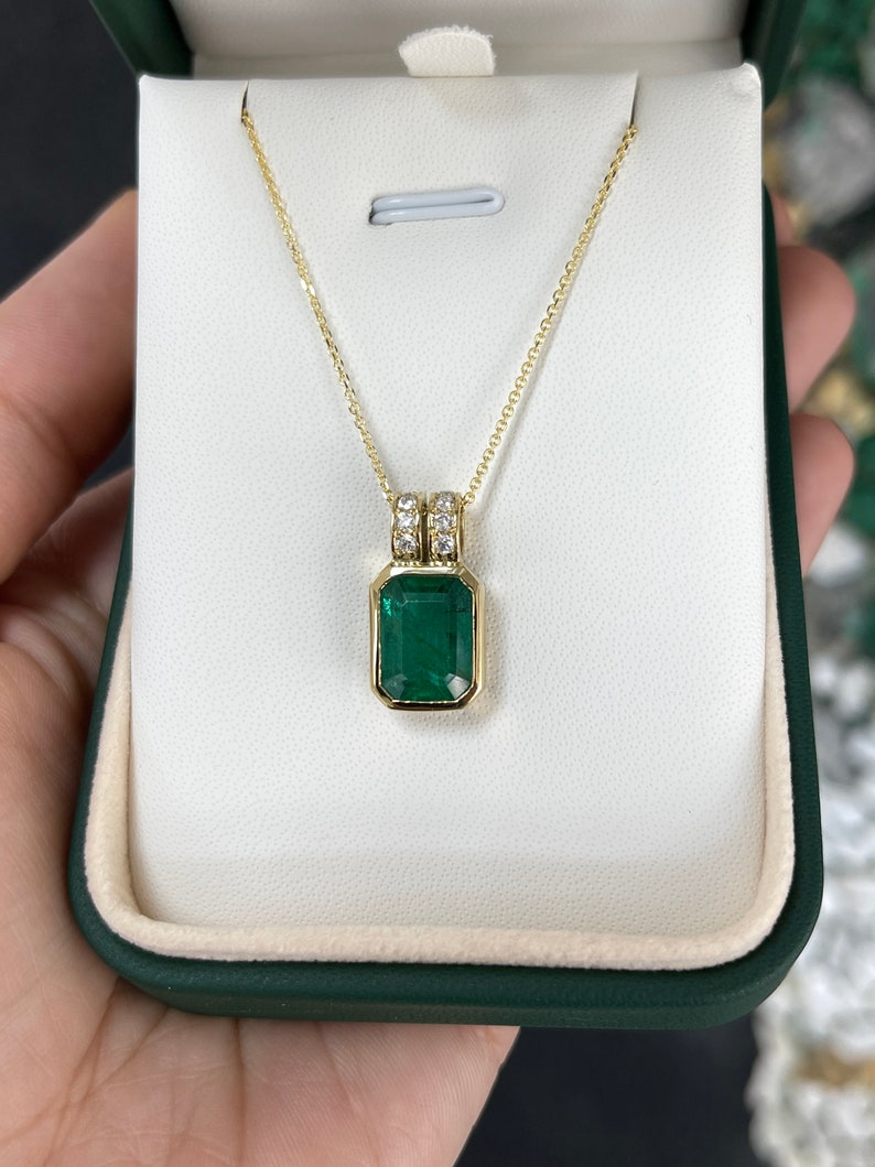 Bezel-Set 4.69 Carat Total Weight Dark Green Emerald Pendant in 18K Gold with Split Bale and Diamond Pave Accents