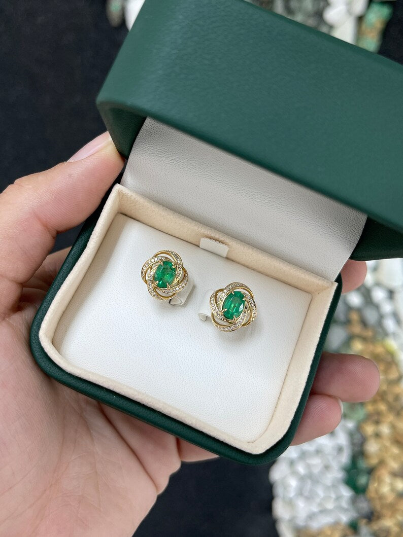 14K Gold Earrings with Stunning 2.31tcw Oval Emerald and Diamond Whirl Halo Design in Medium Dark Green