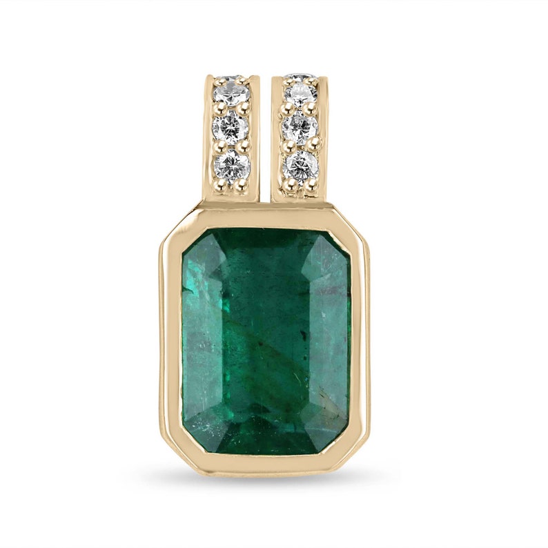 Pendant Featuring a 4.69 Carat Total Weight 18K Gold Natural Emerald with a Bezel Setting and Pave Diamond Accents