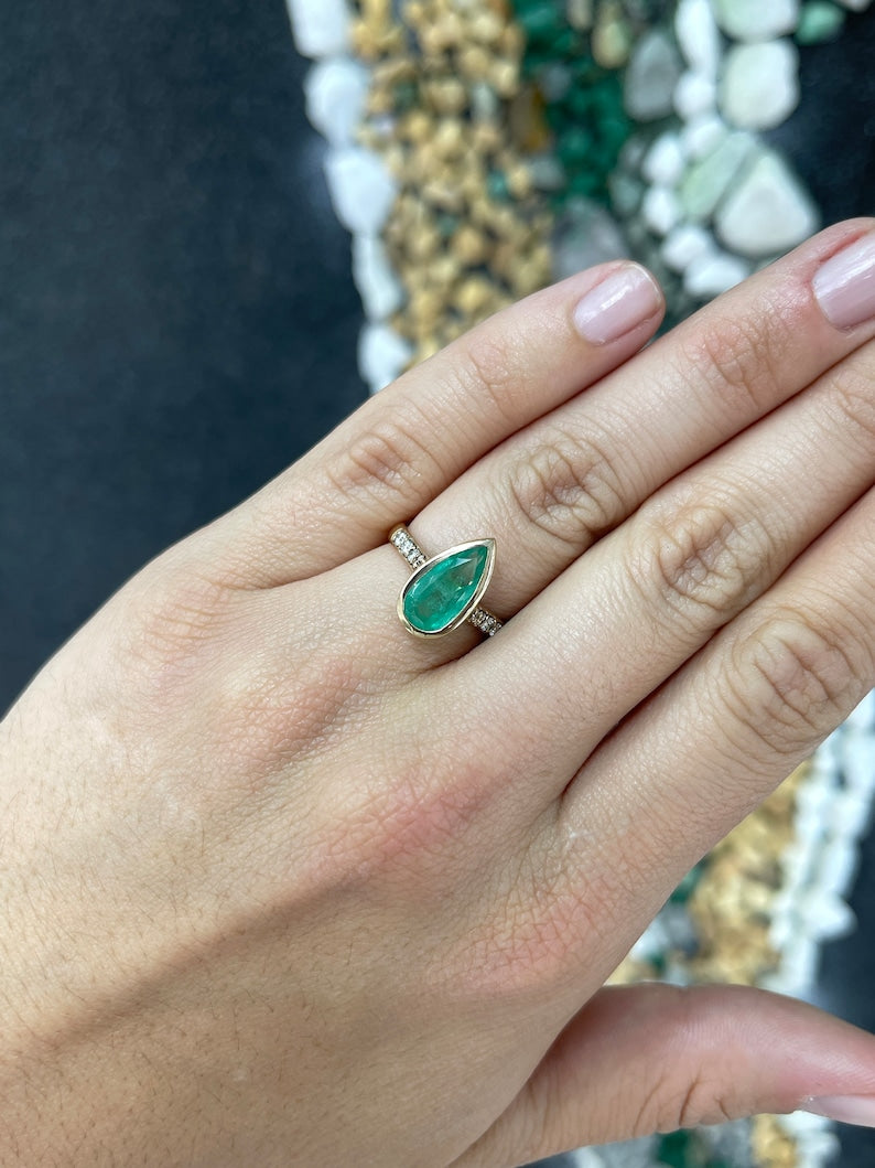 Stunning 14K Gold Engagement Ring Featuring a 2.21tcw Medium Green Pear Cut Emerald