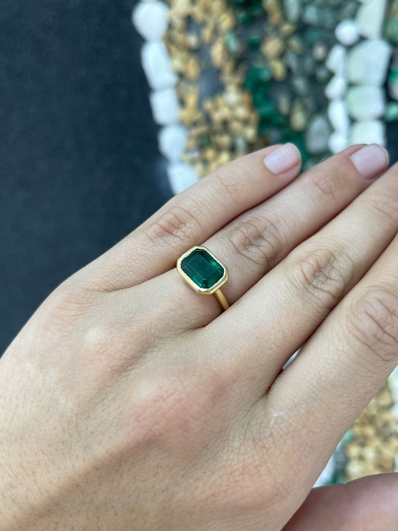 Elegant 14K Gold Engagement Ring Featuring a 4.28ct Dark Alpine Green Emerald Cut Gem