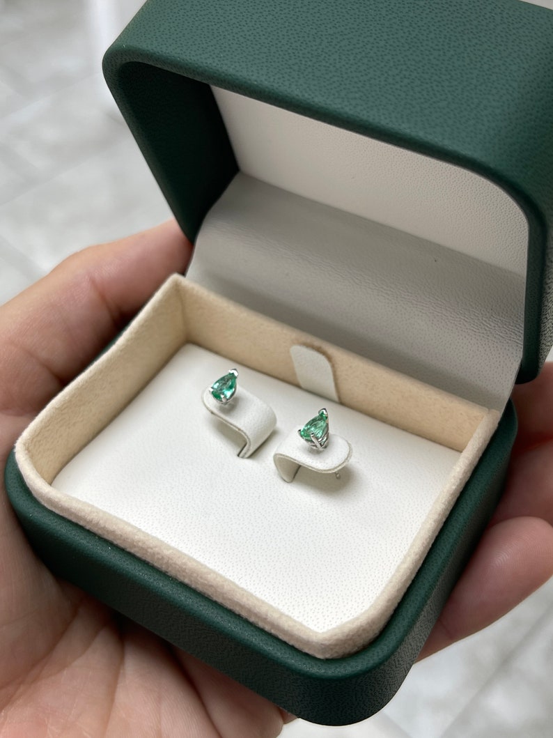 0.70tcw 14K White Gold Light Spring Green Pear Cut Emerald 3 Prong Stud Earrings