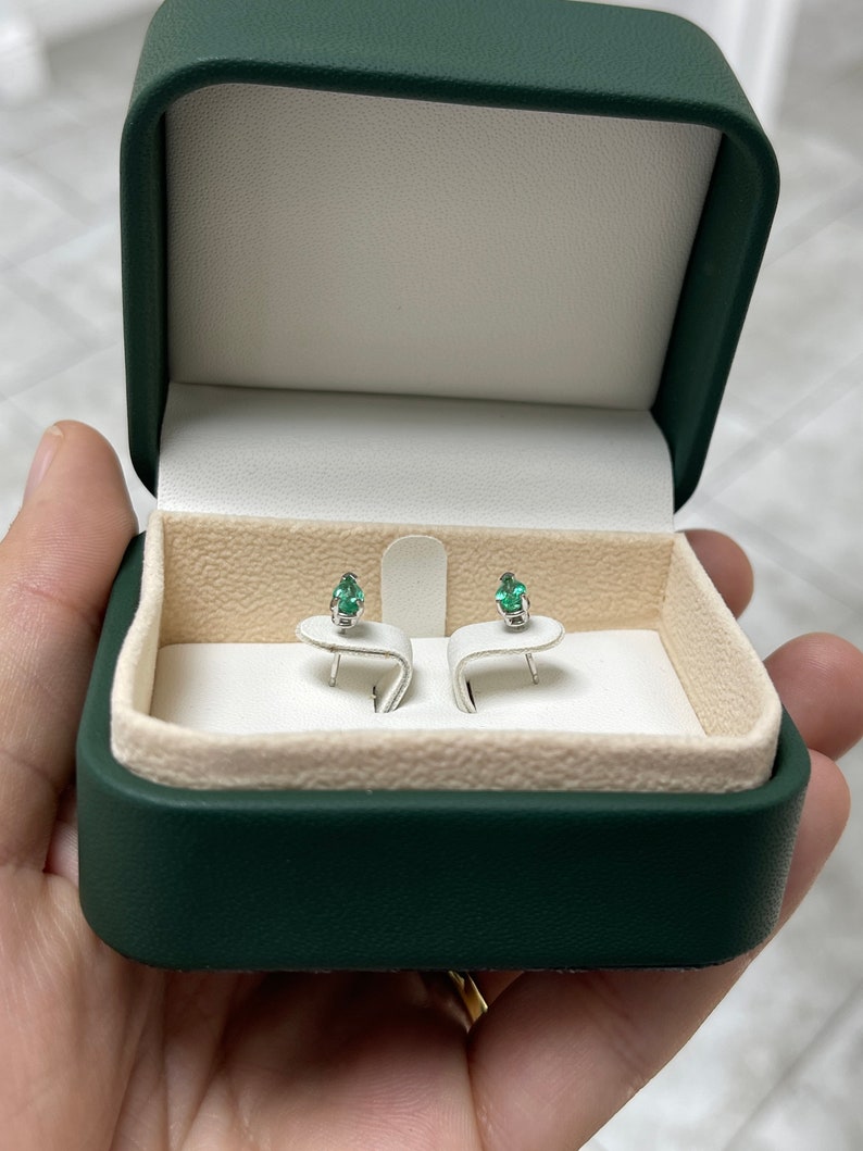 0.70tcw 14K White Gold Light Spring Green Pear Cut Emerald 3 Prong Stud Earrings
