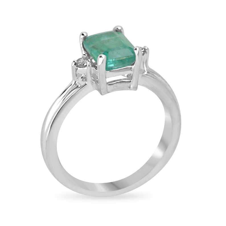 Elegant Sterling Silver Ring Embellished with 1.92 Carat Natural Medium Green Emerald Cut Diamonds